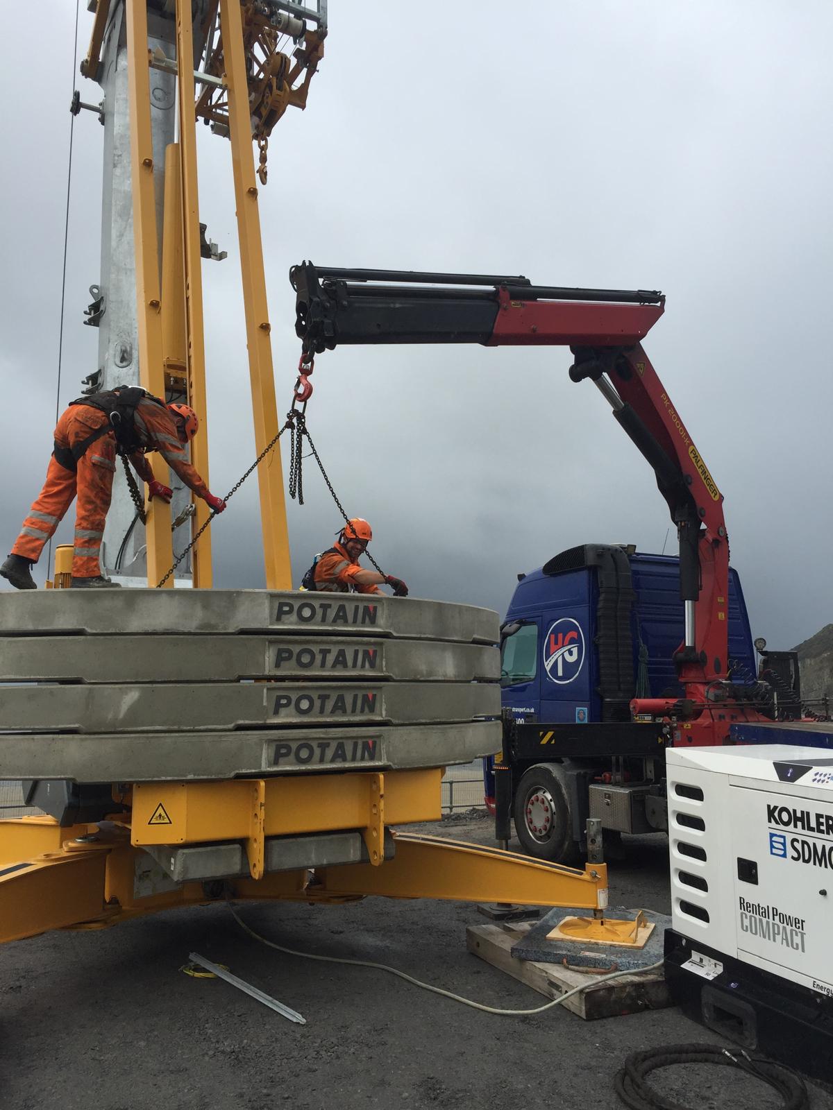 A HIAB crane lorry lifting a load