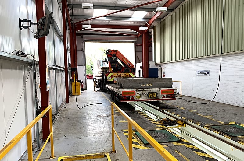 A vehicle over the rolling road brake tester on our lane